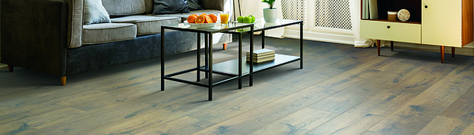 Save money with Mohawk RevWood Plus at American Carpet Wholesalers. This durable but beautiful product will enhance your home with realistic hardwood visuals from a waterproof laminate floor.